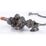 A Victorian silver baby's rattle / whistle, with coral teether, possibly by Hirons & Plante,