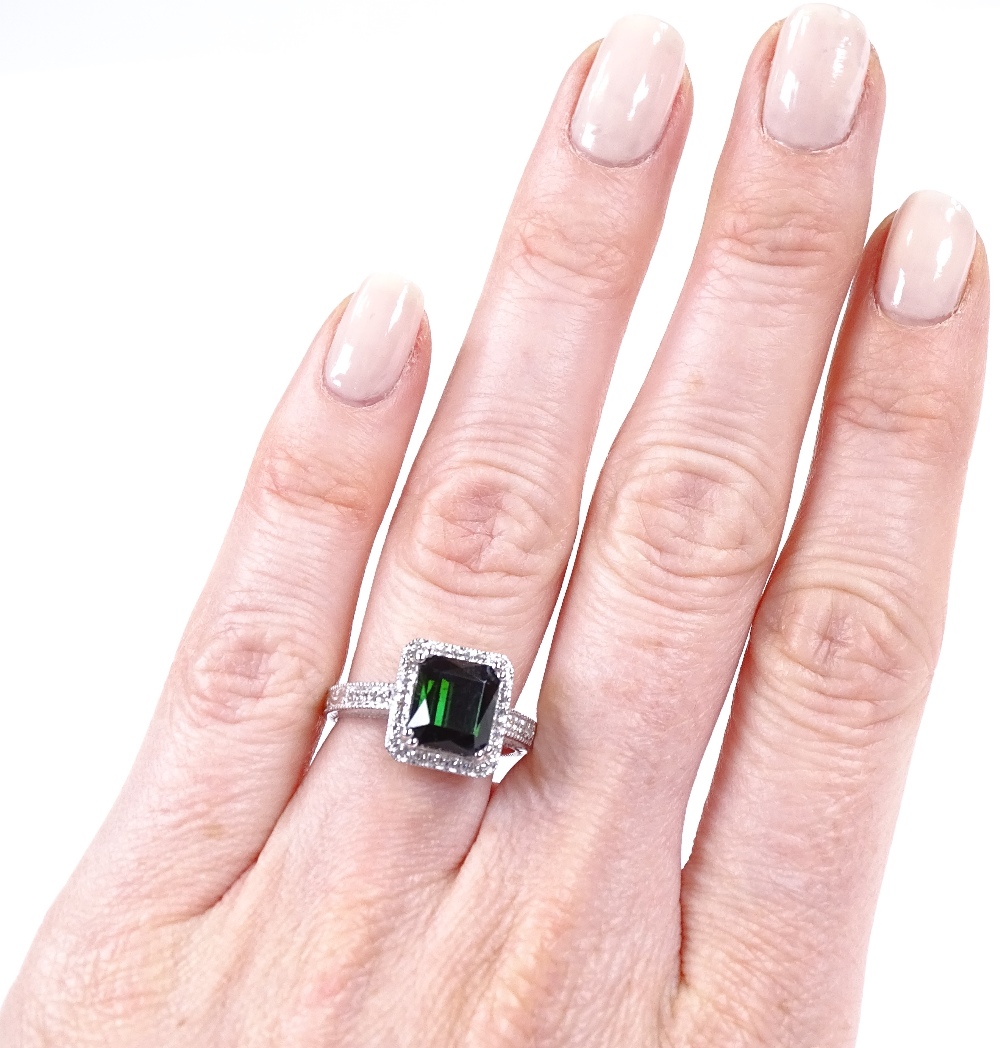 A 14ct white gold green tourmaline and diamond cluster ring, emerald-cut tourmaline approx 3.2ct, - Image 4 of 4