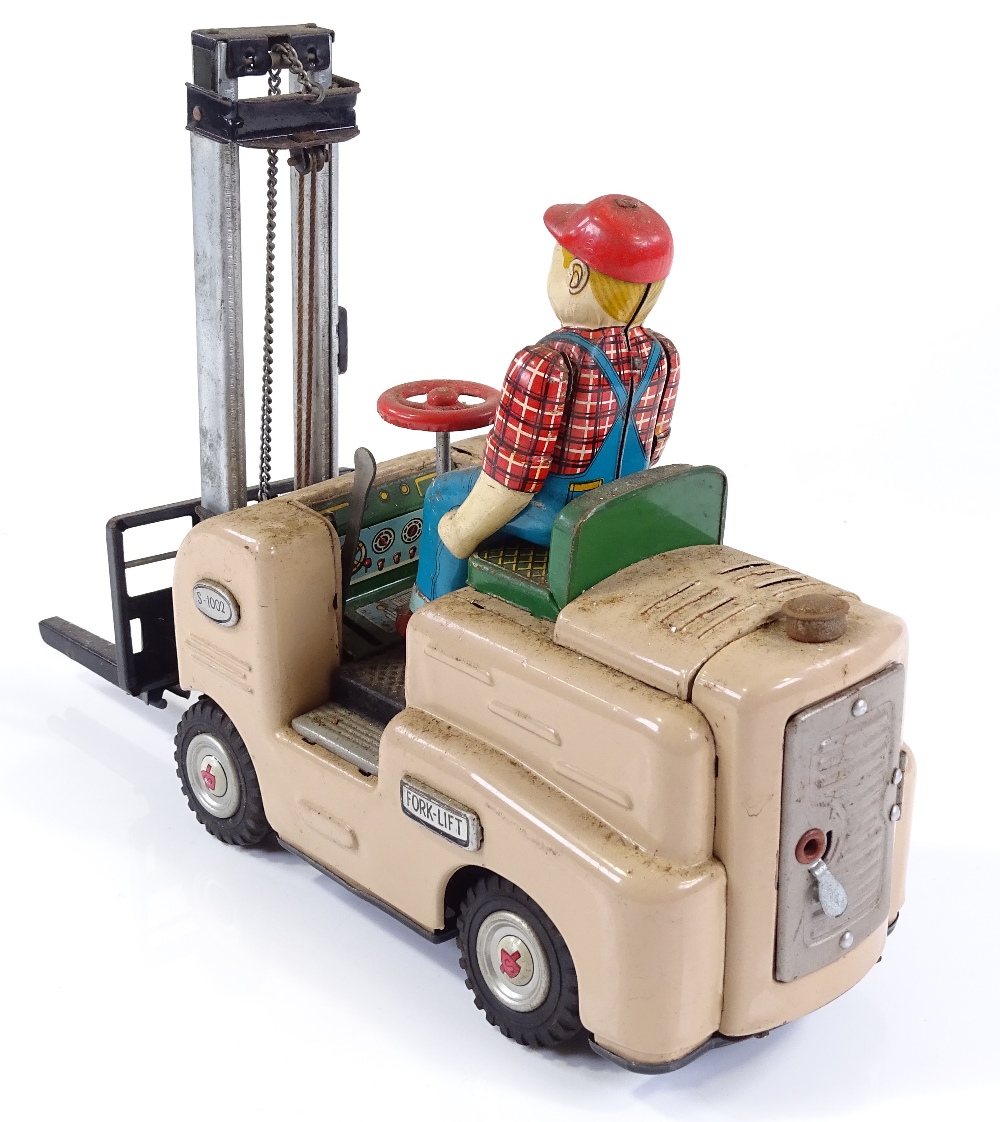 A Japanese tinplate battery operated toy forklift truck, length 27cm - Image 3 of 3