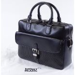 A Mont Blanc black leather holdall bag, new and unused, length 38cm, with shoulder strap, dust
