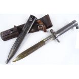 A bayonet knife in original leather and metal scabbard