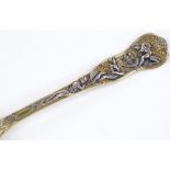 An unusual silver-gilt Victorian spoon, with relief 2-tone Classical figures decoration, by Henry