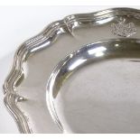 An Austrian Imperial circular silver card tray / salver, with scalloped border and cast-silver