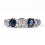 A large 18ct gold 5-stone sapphire and diamond ring, platinum-topped settings, central diamond