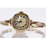 A lady's Vintage 9ct gold mechanical wrist watch, 15 jewel movement, with mother-of-pearl dial, on