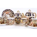 A late Victorian gilded Imari pattern coffee service by Sandbach & Co of Manchester