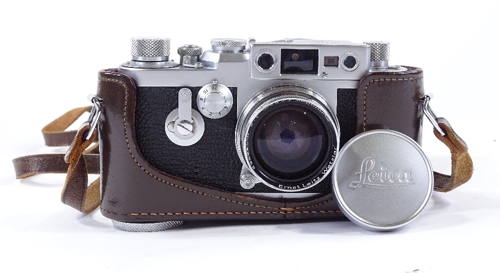 A Leica 111G camera, circa 1959, serial no. 981921, leather-cased