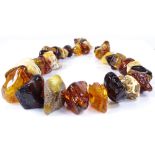 A string of graduated raw amber beads, length 700mm