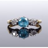 An 18ct gold 3-stone blue zircon and diamond ring, setting height 5.7mm, size J, 2.4g