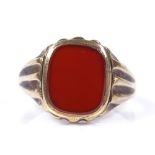 A 9ct gold carnelian seal signet ring, setting height 14.3mm, size U, 4.3g