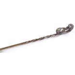 A 2-stone diamond set drop stickpin, set with a round and pear-cut diamond, pear-cut measures 5.63mm