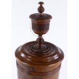 A large lignum vitae wassail bowl and cover, the circular lid surmounted with a spice cup and cover,
