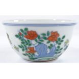 A Chinese doucai enamel chicken cup, with 6 character mark, height 4cm, diameter 8cm