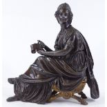 A 19th century patinated bronze seated Classical figure, unsigned, height 25cm, length 24cm