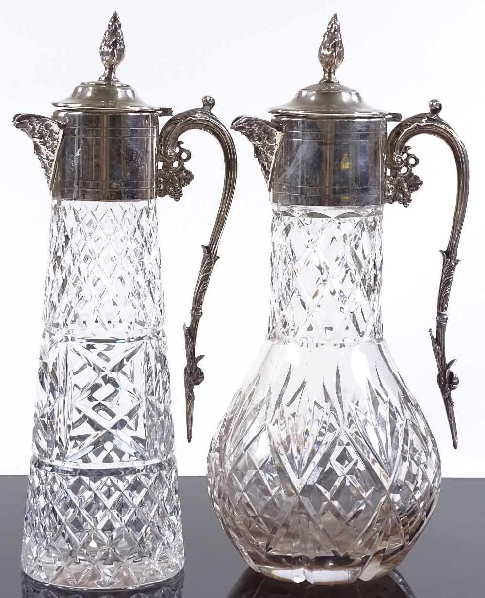 2 cut-glass and silver plate claret jugs