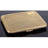 A 9ct gold engine turned cigarette case, length 82mm, 66.4g