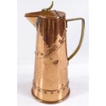 A WMF Arts and Crafts copper jug of tapered circular form, with rivet decoration, height 21cm