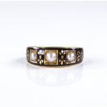 A Victorian 18ct gold pearl and black enamel mourning ring, maker's marks BD Co, hallmarks London