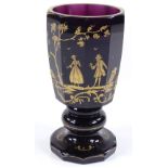 A 19th century Russian amethyst glass beaker of faceted circular form, with painted gilded figures