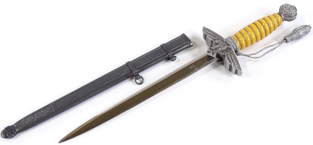 A miniature German 2nd model Luftwaffe dagger, manufactured by SMF Solingen, overall length 24cm,