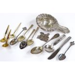 Silver and enamel teaspoons, a silver tea strainer etc