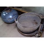 An iron 2-handled copper pan, and another