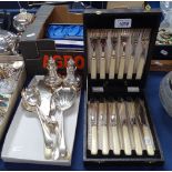 A cased fish service, plated serving spoons, a fish slice etc