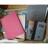 A box of postage stamp albums etc