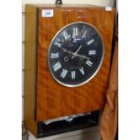 A Russian Vega wall clock with 2-train movement, width 11"