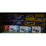 A collection of diecast boxed cars