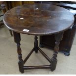 A 17th century oak cricket table on baluster turned legs, W58cm, H70cm