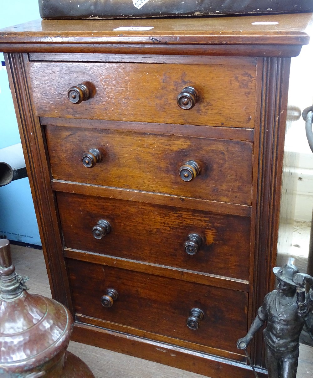 A Victorian walnut table-top chest of 4 drawers, height 18", width 13.5"