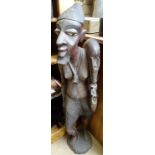 A large carved hardwood African figure, height 40"