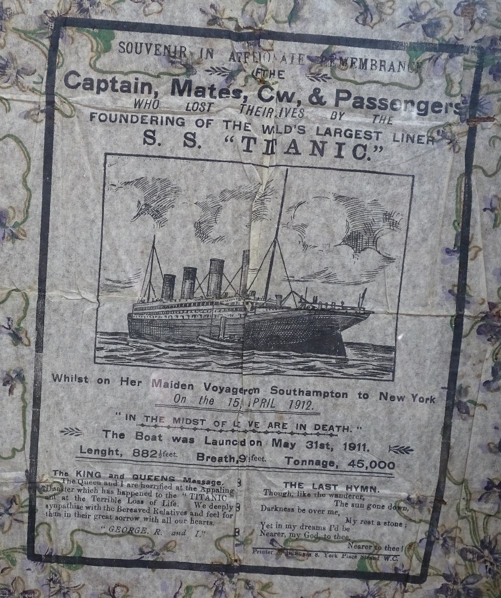 A printed paper serviette, Souvenir In Remembrance of the RMS Titanic 1912, framed