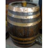 A copper and oak Sherry barrel, height 13.5"