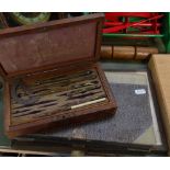 Mahogany-cased brass drawing instruments, stencil outfit and carbon paper