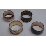 2 pairs of silver napkin rings, 1 pair engraved RAF