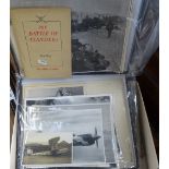 A collection of military press photographs and ephemera