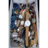 A box containing costume jewellery, wristwatches etc
