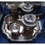 A silver plated 4-piece teaset, a tankard, a cocktail shaker, a toast rack and tray