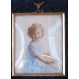 A gold-framed miniature watercolour study of a child, in folding case, height 4.75" overall