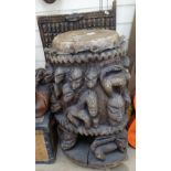 An African carved wood drum with figure decoration, height 28"