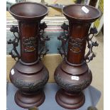 A pair of Japanese relief cast bronze vases, height 13.5"