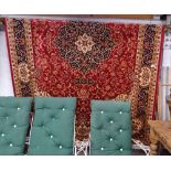 A red ground Keshan carpet, 280cm x 200cm
