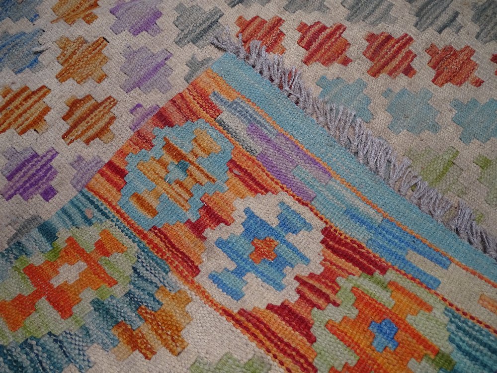 A vegetable dyed wool Choli Kilim rug, 205cm x 142cm - Image 2 of 2