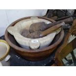 A marble mortar, 2 wooden pestles, and a crock