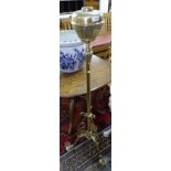 An Art Nouveau brass floor standing oil lamp, H138cm