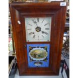 A 19th century American walnut-cased kitchen wall clock