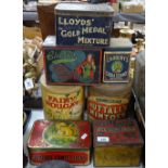 A group of Vintage shop display tins