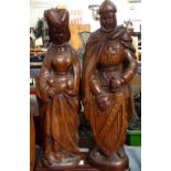 A pair of carved wood figures, 18"